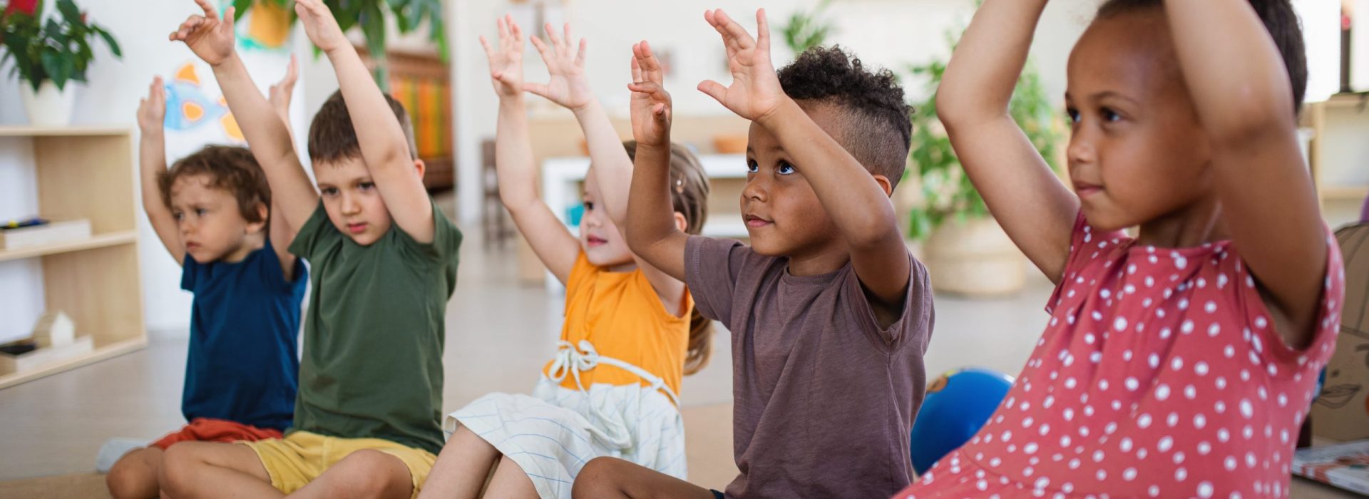 group-of-small-nursery-school-children-sitting-on-2022-01-18-23-39-03-utc-min
